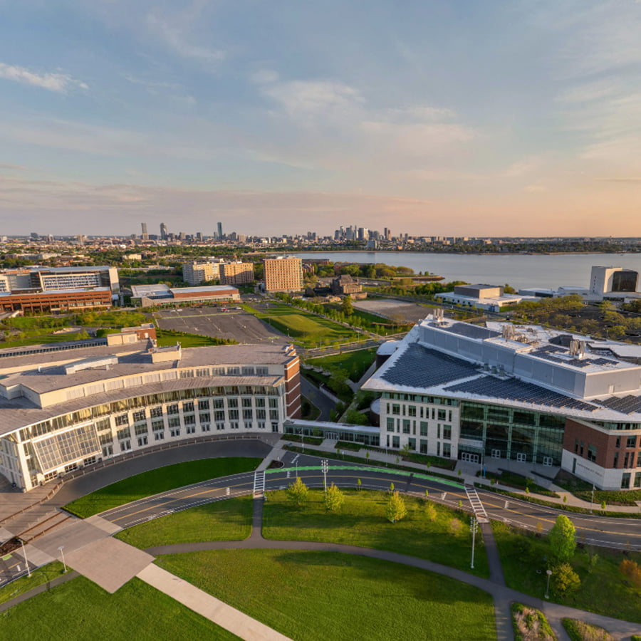 Photo of UMass Boston with the city in the background