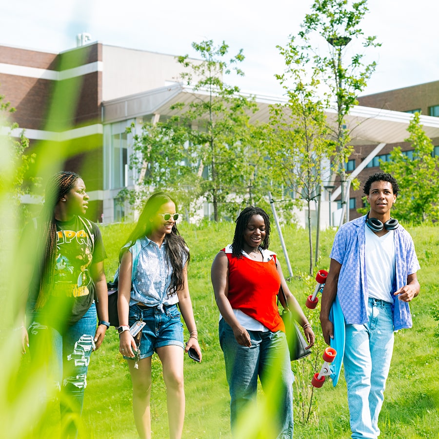 students on a quad walk