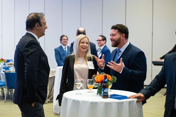 Alumni networking at College of Management 50th Event