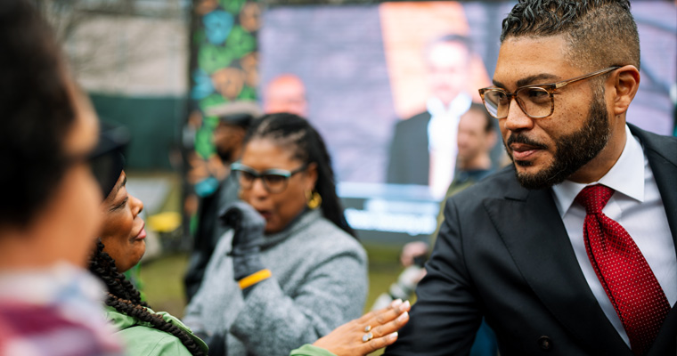 Imari Paris Jeffries greets a supporter at The Embrace unveiling.