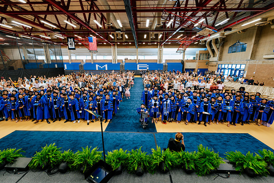 Clark Athletic Center, filled with graduating doctoral candidates and their families, friends and supporters